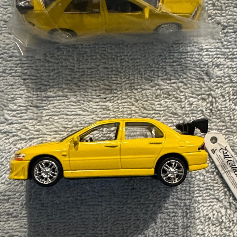 NWT ERTL Collectibles 2002 Mitsubishi Lancer Evolution Die Cast Model set of 2